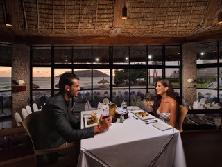 A couple having dinner at La Concha Restaurant