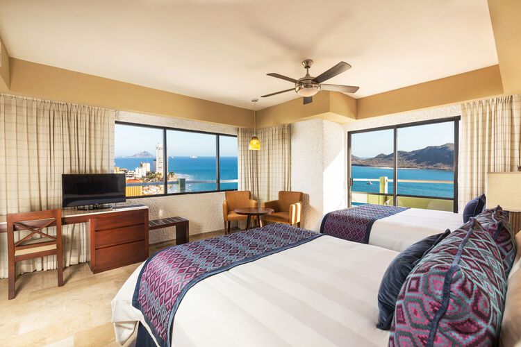Unwind in spacious and comfortable rooms and suites and book the one that meets your needs